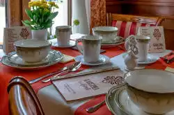 A set table with a menu